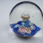 Small girl figure in patriotic colors