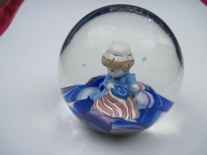 Small girl figure in patriotic colors